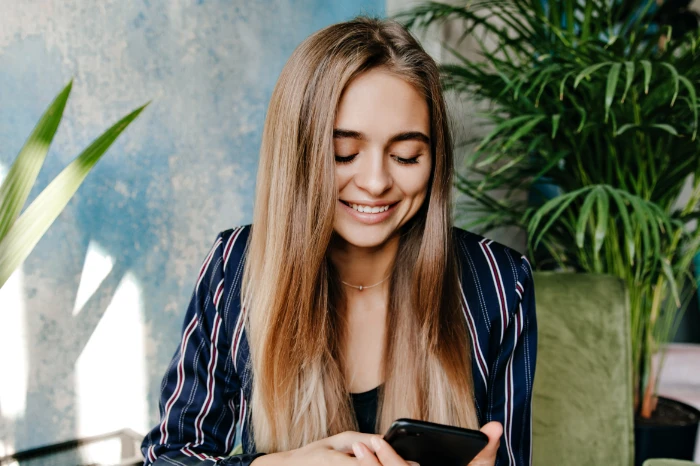 A woman using a phone
